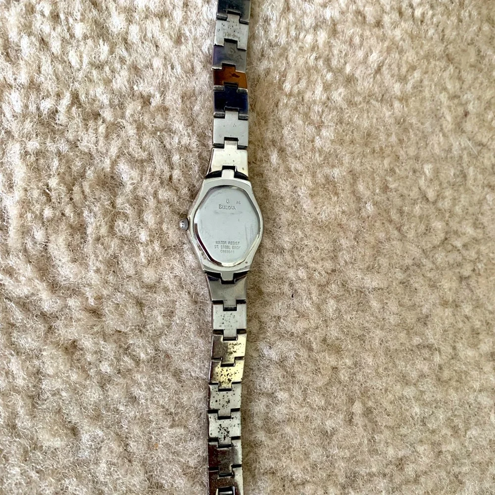 Bulova Silver Ladies Caravelle Black Dial Crystal Bezel Water Resistant Watch